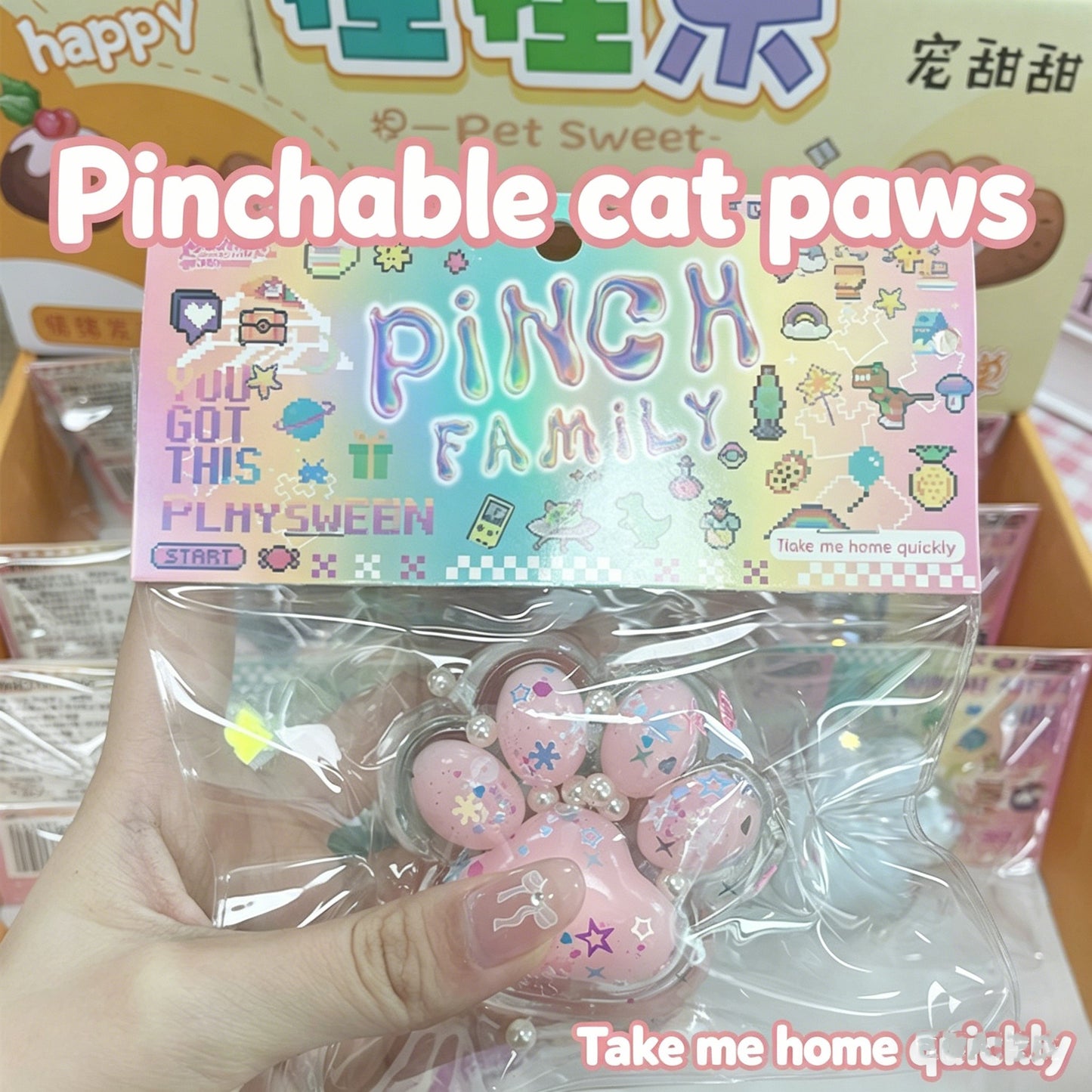 "Hand pinching glitter cat paw squeeze toy with floating star sequin and pearl inside"