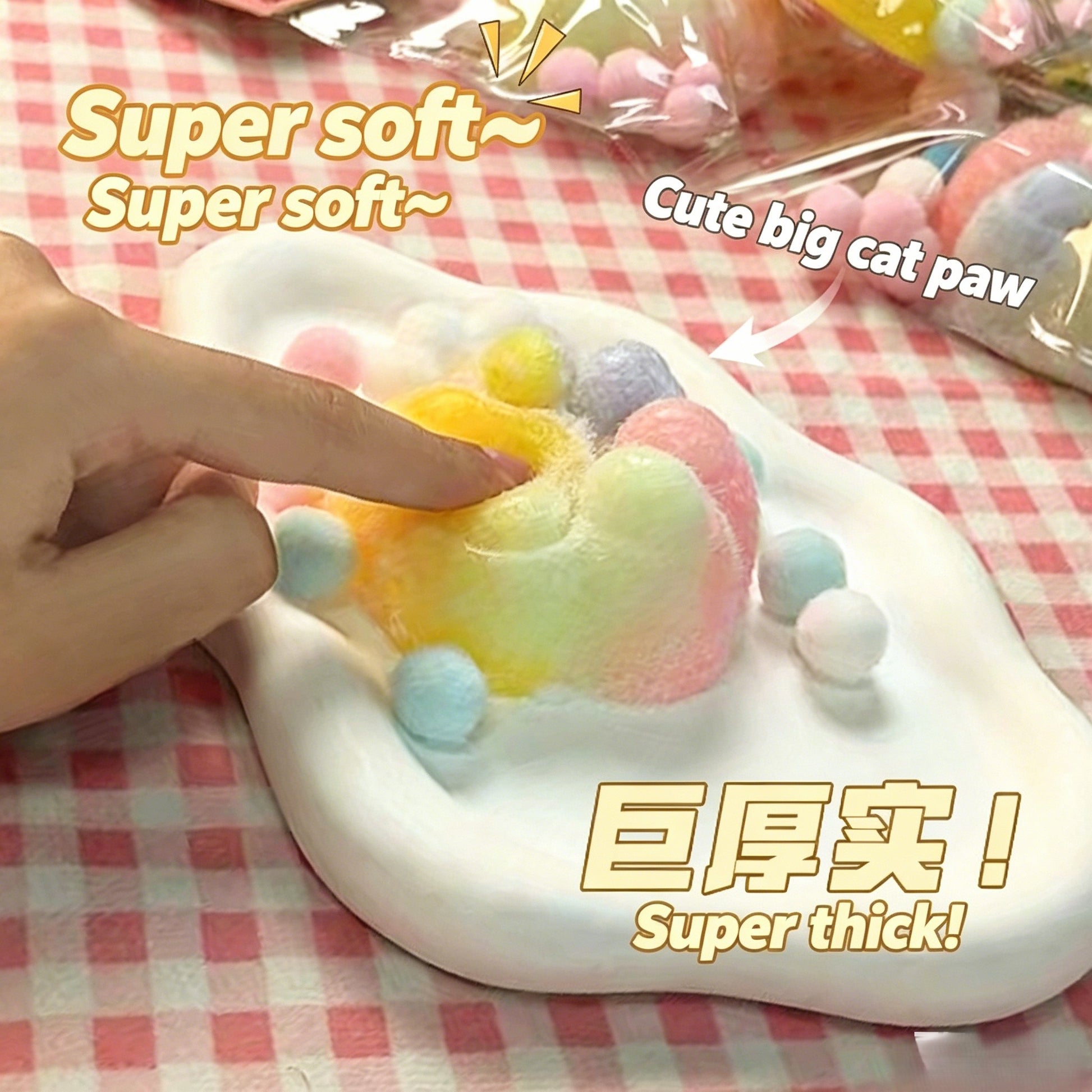 "Multiple plush cat paw squishy toys displayed on a woven basket"