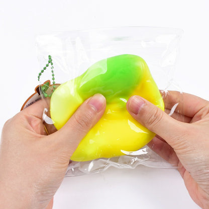 "Individually packaged fluid mango squishy toy with gradient green-yellow color"