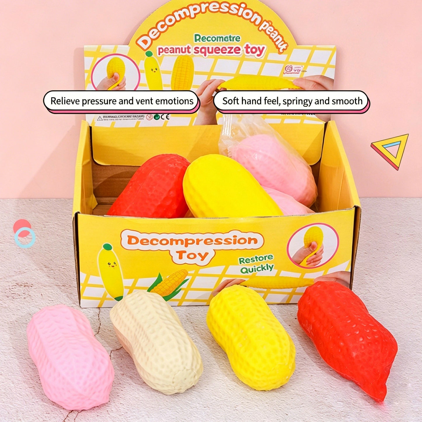 "Colorful peanut squeeze toys in red, yellow, pink and beige for stress relief"