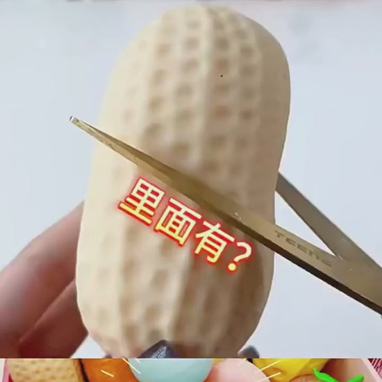 "Hand squeezing soft peanut-shaped squishy toy showing slow rebound effect"