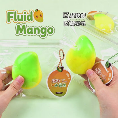 "Hand squeezing fluid mango squeeze toy showing soft and flowing texture"