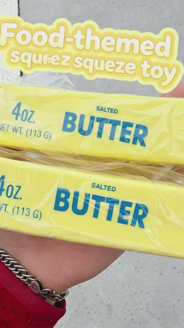 "Lifelike butter bar squeeze toy with unique sticky-to-touch sensory effect"