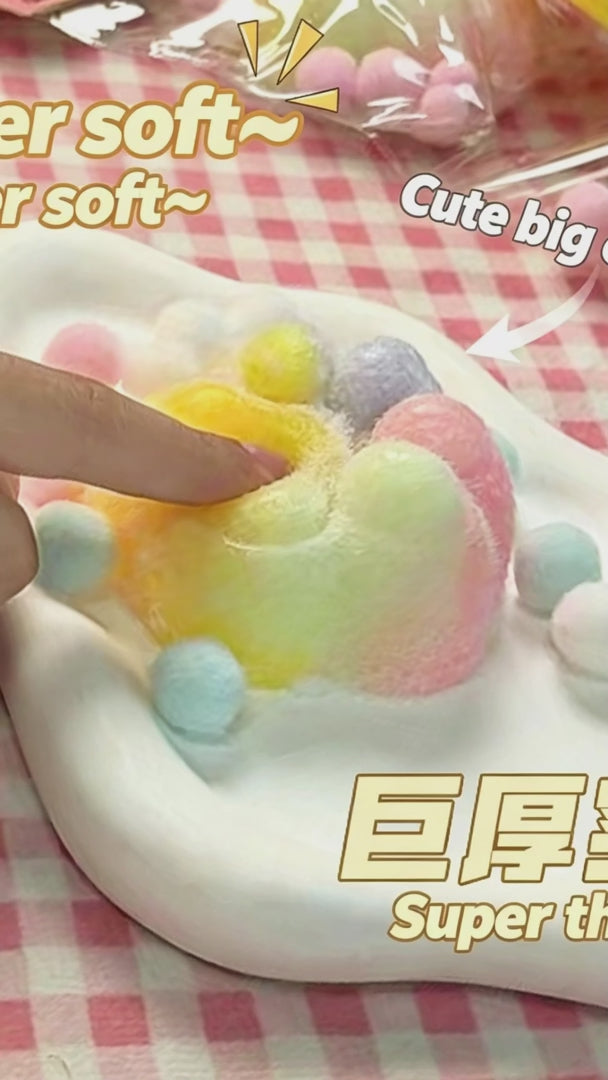 "Hand squeezing plush cat paw squeeze toy showing soft and flowing texture"