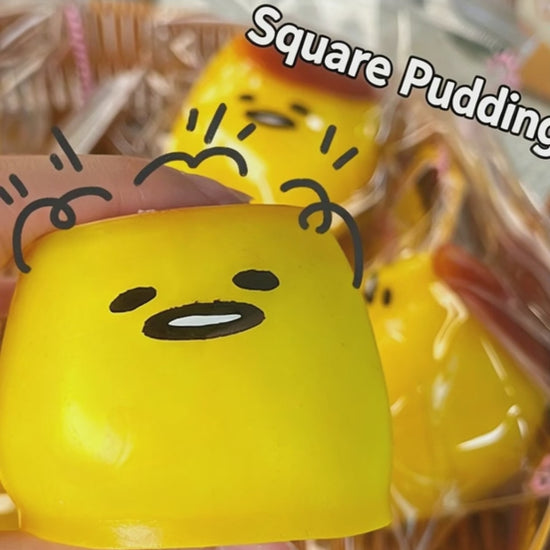 "Multiple cute pudding squishy toys in gift box for stress relief and gifting"