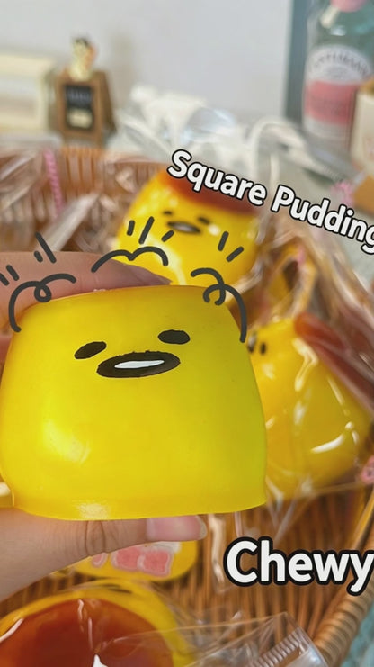 "Multiple cute pudding squishy toys in gift box for stress relief and gifting"